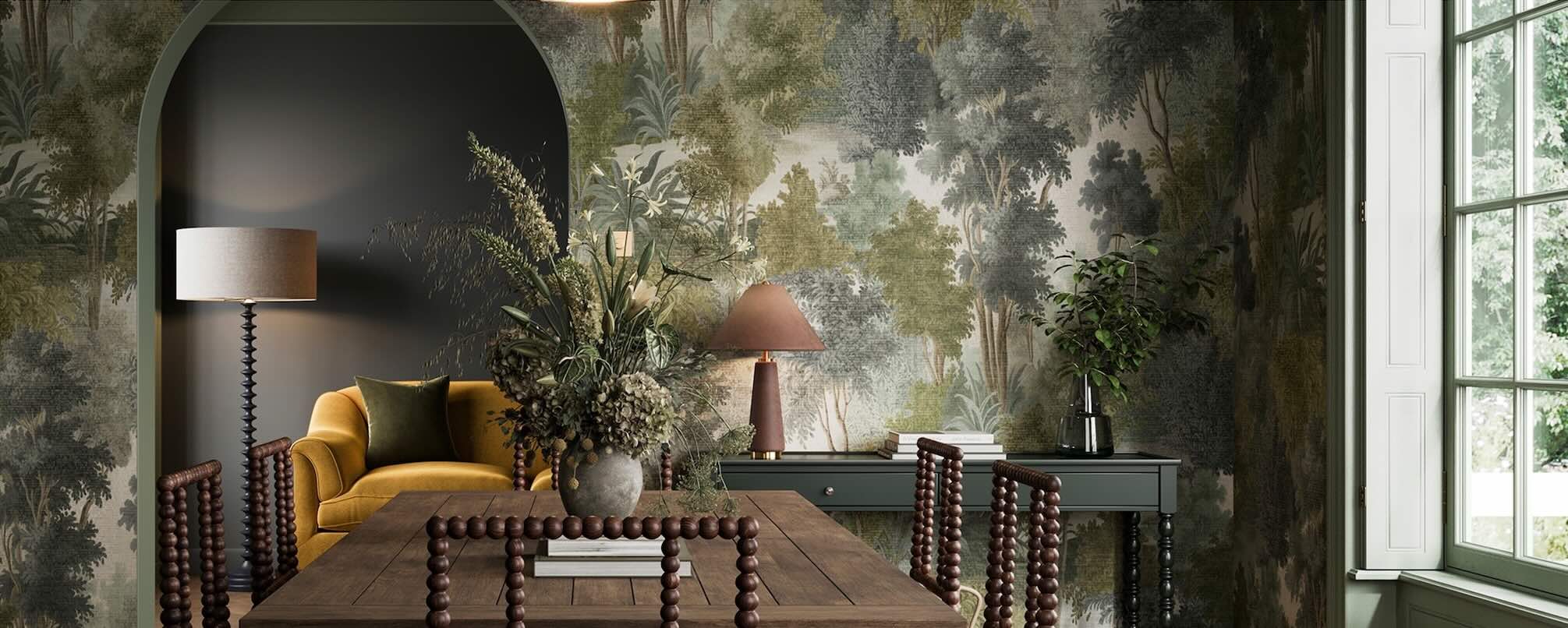 Superfresco Easy Wallpaper Collection - Image of a dining room decorated in a large-scale wallpaper featuring hand-painted trees in rich forest green tones.